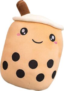 Kawaii-inspiriertes Boba-Tee-Plüschkissen mit freundlichem Gesicht und schwarzen Punkten.