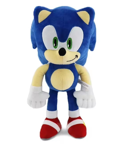 Blaues Plüschtier im Cartoon-Stil mit roten Schuhen auf weißem Hintergrund.