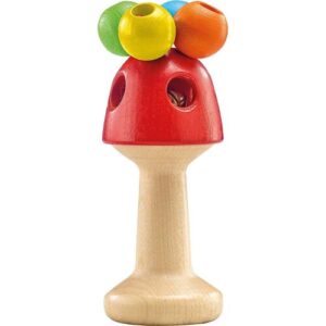 Holzspielzeug in Pilzform mit bunten Perlen oben.